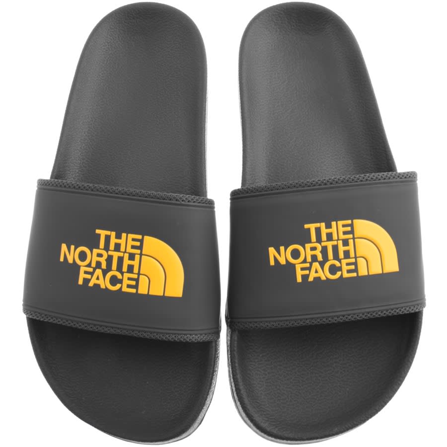 pink north face sliders